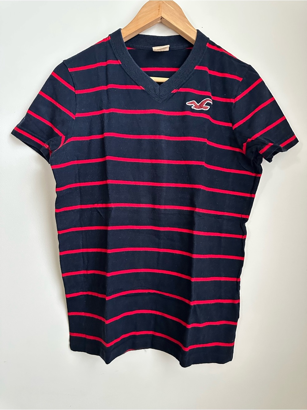 Hollister Vintage Men’s Navy V-Neck Tee with Red Stripe Detail